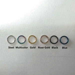 Polished 316 stainless steel seamless rings in silver, rainbow, gold, black, and blue finishes