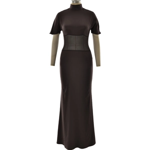 Detail showing the semi-sheer mesh waist patchwork on a dark coffee maxi dress