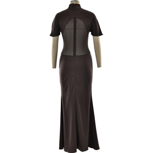 Detail of sheer mesh back panel on a chocolate brown slim fit maxi fish-tail dress