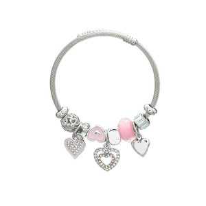 Silver woven beaded bracelet featuring pink enamel hearts and crystal charms on white background