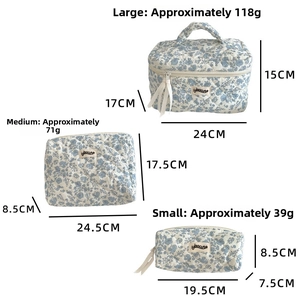 Size guide for floral quilted cosmetic bags in large, medium, and small dimensions