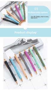 Macro detail of sparkly glitter retractable ballpoint pens in seven assorted vibrant colors