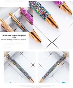 Macro shot of glittery metal ballpoint pens with rose gold clips and retractable nibs