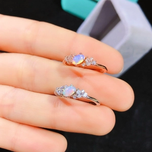 Natural oval opal rings in rose gold and silver finish with sparkling side stones