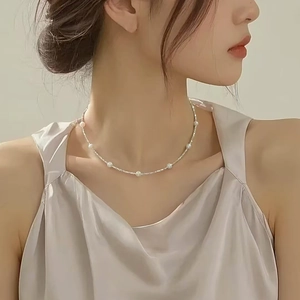 Elegant S925 silver necklace with scattered silver beads and lustrous white pearls