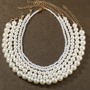 Elegant four-layer faux pearl necklace set with golden adjustable lobster clasp closure