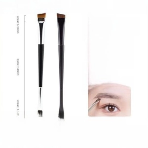 Dual-ended eyebrow brush with dimensions showing 140mm length and synthetic bristles