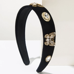 Padded black velvet headband with gold butterfly and crystal embellishments