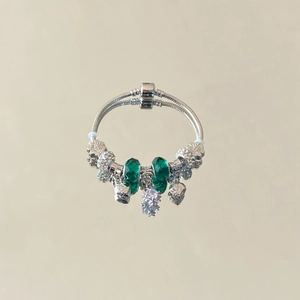 Pandora style starry blue charm bracelet with green beads and moon heart pendants