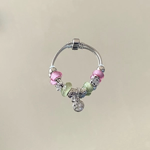 Pandora style bracelet with silver snake chain, pastel glass beads and tree charm