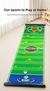 Macro view of long football-themed indoor goal mat with sticky balls for tabletop gaming