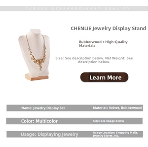 Detail of necklace display stand with cream velvet bust and premium rubber wood base