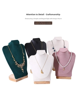 Detail of necklace display bust set with velvet finish and solid wood bases in five colors