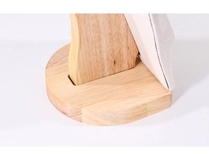 Detail of the smooth natural wood base and joint on the jewelry display neck stand