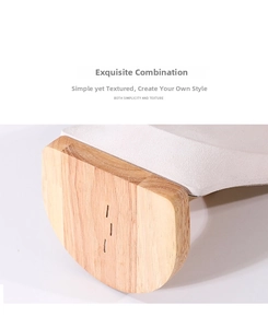 Close-up of premium necklace display stand with solid wood base and beige suede finish