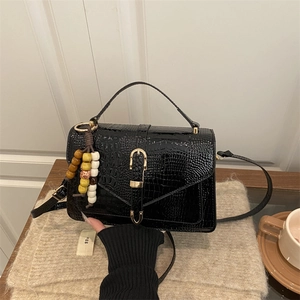 Classic black crocodile texture small square bag with gold buckle and beaded tassel