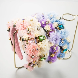 Set of four floral headbands with rhinestones and faux pearls in pastel spring colors