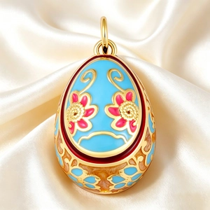 Macro shot of blue enamel Faberge-style floral egg pendant on cream satin fabric