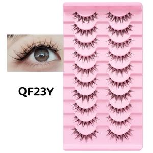 Close-up of 10 pairs of natural false eyelashes with thin fish line stems in QF23Y style