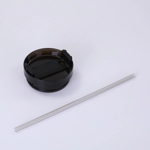 Detail view of a 30oz tumbler lid with a straw and leak-proof silicone seal ring