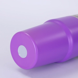 Close-up of the purple matte coating and layered base structure on the stainless steel tumbler