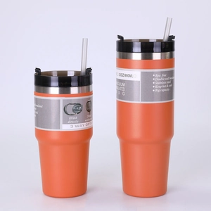 Detail of 30oz orange double wall stainless steel insulated cups with lids and straws