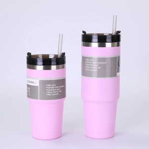 Detail of 30oz pink stainless steel insulated tumbler with BPA-free label and straw