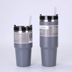 Detailed view of dark grey 30oz vacuum insulated travel tumbler with lid and straw