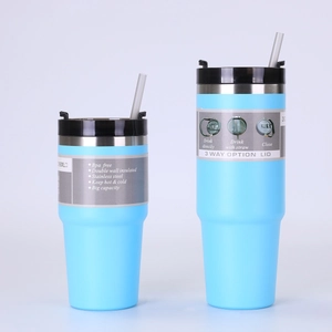 Detail of 30oz blue stainless steel tumblers showing the lid and dual-wall insulation