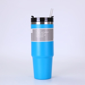 Detail of light blue matte stainless steel tumbler with straw and BPA free lid
