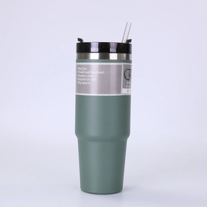 Detail of matte olive green stainless steel tumbler with vacuum insulation and straw lid