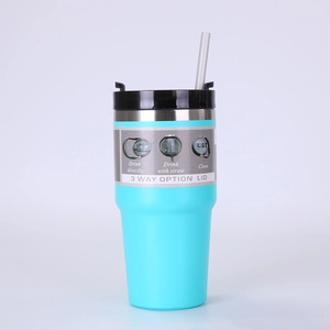 Detail of blue insulated tumbler lid showing three-way drink options and matching straw