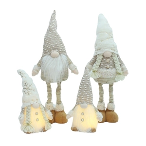 Weihnachtswichtel Plüschpuppen mit langen Beinen und LED Lichtern für festliche Dekoration.