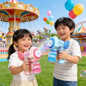 Kids' angel bubble gun in pink and blue with colorful lights in an amusement park setting