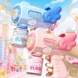 Electric angel wing bubble gun for kids in blue and pink with dreamlike city backdrop