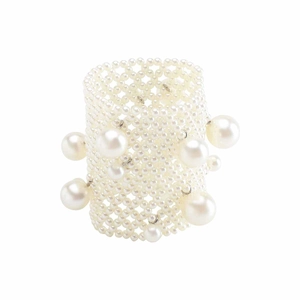 Macro detail of elastic multi-row pearl wide bracelet with woven mesh and large drops