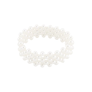 Detailed close-up of white triple-layer elastic beaded bracelet with faux pearl luster