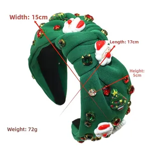 Detail view of green Christmas headband dimensions 15cm x 17cm x 5cm and 72g weight