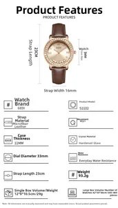 Détails d'une montre or rose avec strass flottants et bracelet en cuir marron