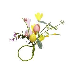 Detail of Easter napkin ring with tulips, pastel eggs, and berries on a green stem base
