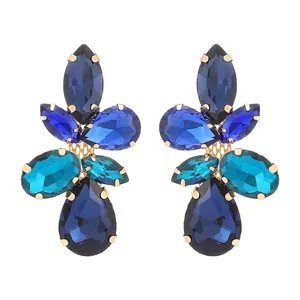 Vintage gold-tone cluster drop earrings with navy blue and teal crystal glass leaves