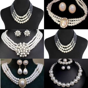French vintage pearl necklace set with cross pendant and rhinestone cat eye stone details