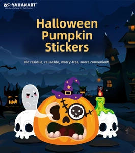 Macro detail of reusable Halloween monster stickers with pumpkin face DIY elements