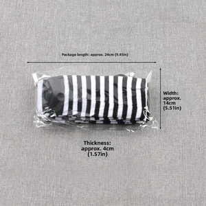 Striped holiday socks in transparent packaging with dimensions 24x14x4 cm for storage