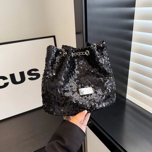 Sparkly black sequined drawstring bucket bag with silver metal chain and fashion details