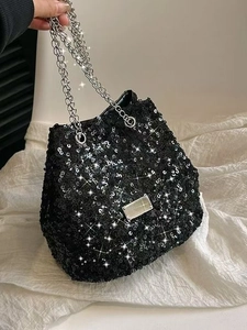 Chic black sequin bucket bag with silver chain straps for evening parties