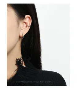 Close-up of S925 sterling silver C-shaped hoop earring and minimalist ear cuff set