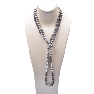 Elegant double-layer long grey pearl necklace with lustrous finish on a white mannequin