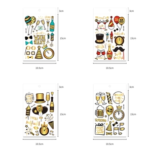 Detail view of New Year stickers with gold foil patterns and precise size dimensions