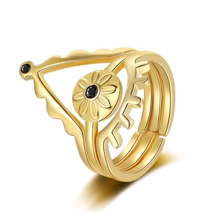 Adjustable evil eye stackable ring with gold plating and black gemstone accents